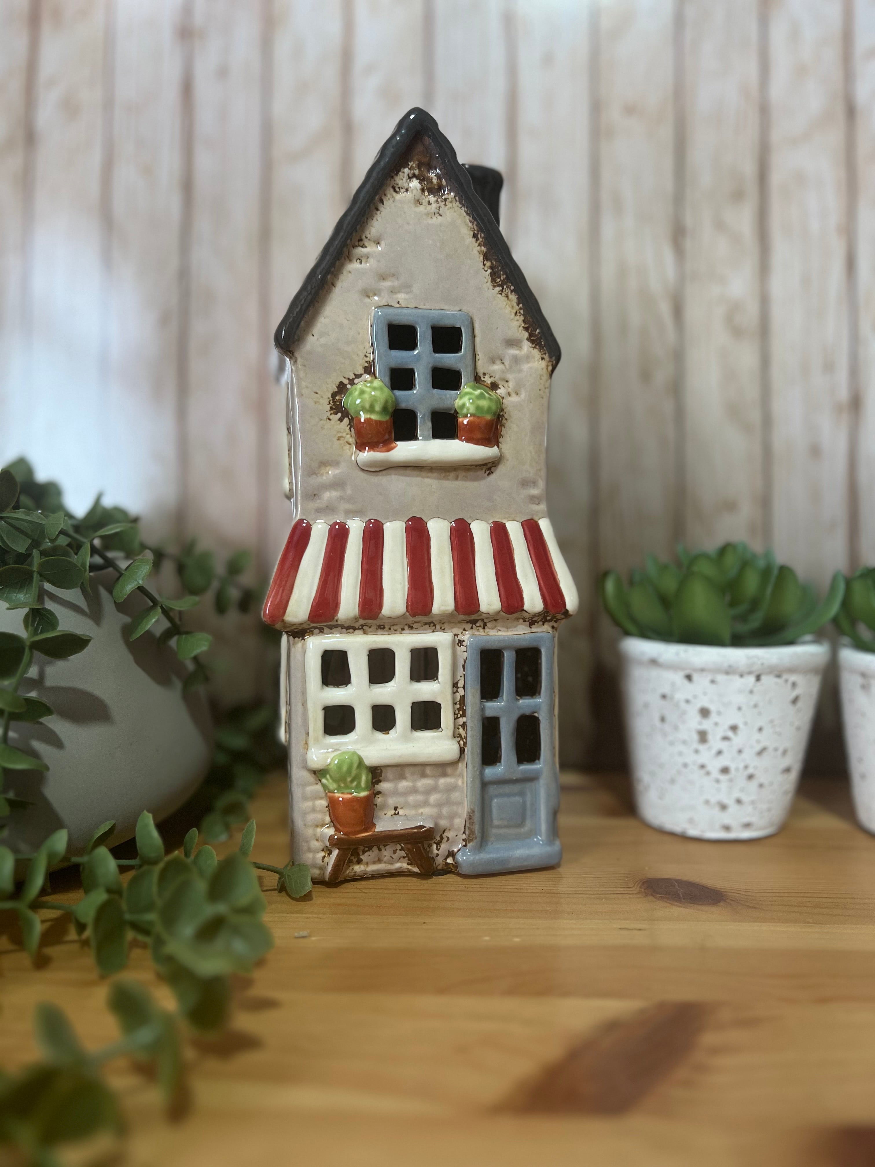 Tall Glazed Ceramic House with Bench, Pot Plants and Awning